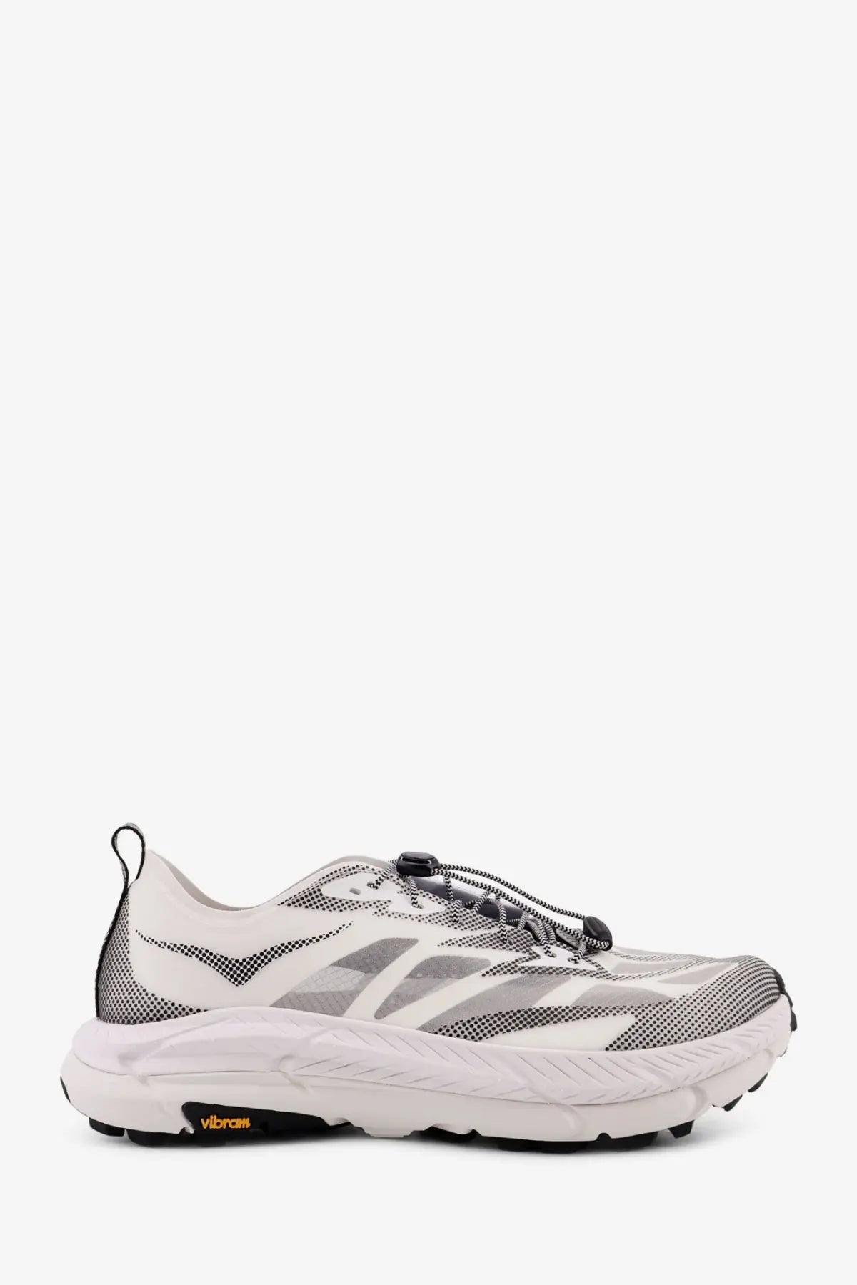 White and gray hoka men’s mafate speed lite ts running shoe with mesh upper black laces and orange vibram logo on sole