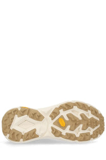 The hoka unisex mafate speed lite sneaker beige features a rugged tan rubber outsole with deep treads and a yellow vibram logo