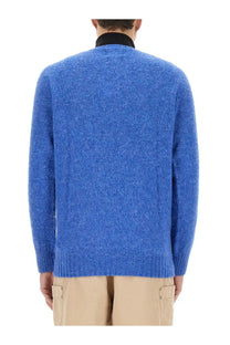 Howlin men’s wool jersey blue sweater with blue heathered knit and ribbed cuffs and hem