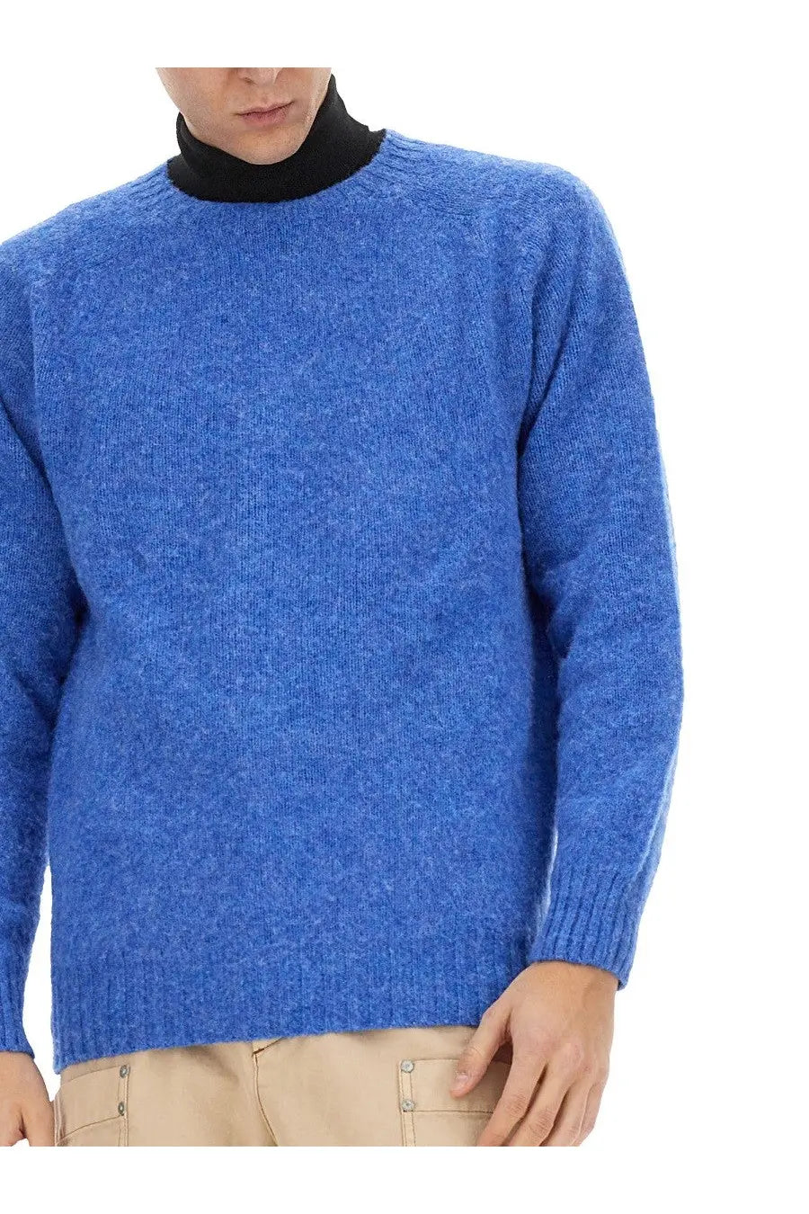 Blue heathered wool sweater with ribbed cuffs and hem from howlin men’s wool jersey collection