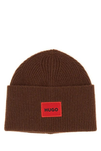 Hugo boss men’s brown ribbed knit beanie hat with red rectangular hugo logo patch on folded brim