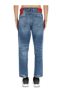 Hugo boss men’s blue denim jeans with faded wash and distressed cuffs and back pockets with red branded patches