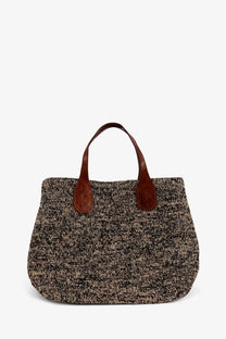 Ibeliv women’s Rio raffia shoulder bag Tiga with textured brown and beige woven body and tan leather handles
