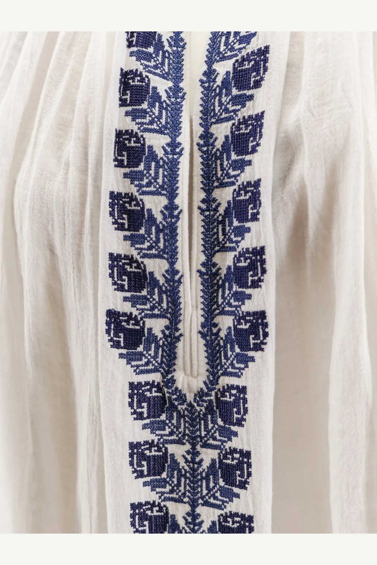 Isabel Marant Étoile women’s white organic cotton shirt with intricate navy blue embroidered floral patterns along front