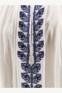 Isabel Marant Étoile women’s white organic cotton shirt with intricate navy blue embroidered floral patterns along front