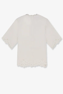 Cream-colored Isabel Marant Étoile women’s Shana cotton blouse with delicate eyelet embroidery on neckline sleeves and hem