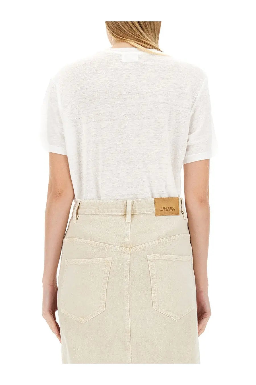 Beige denim skirt with brown leather brand patch at waistband shown with isabel marant étoile women’s shirt zewel white