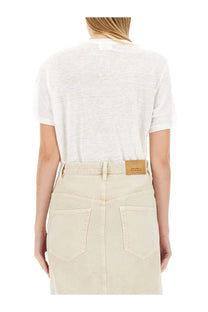 Beige denim skirt with brown leather brand patch at waistband shown with isabel marant étoile women’s shirt zewel white