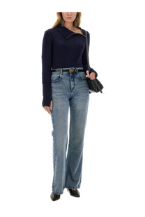 Navy blue long-sleeved knit top with distinctive collar detail paired with isabel marant women’s belvira jeans blue