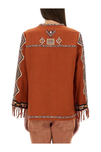 Isabel Marant women’s rust-colored embroidered blouse with geometric patterns and fringe detailing on sleeves and hem