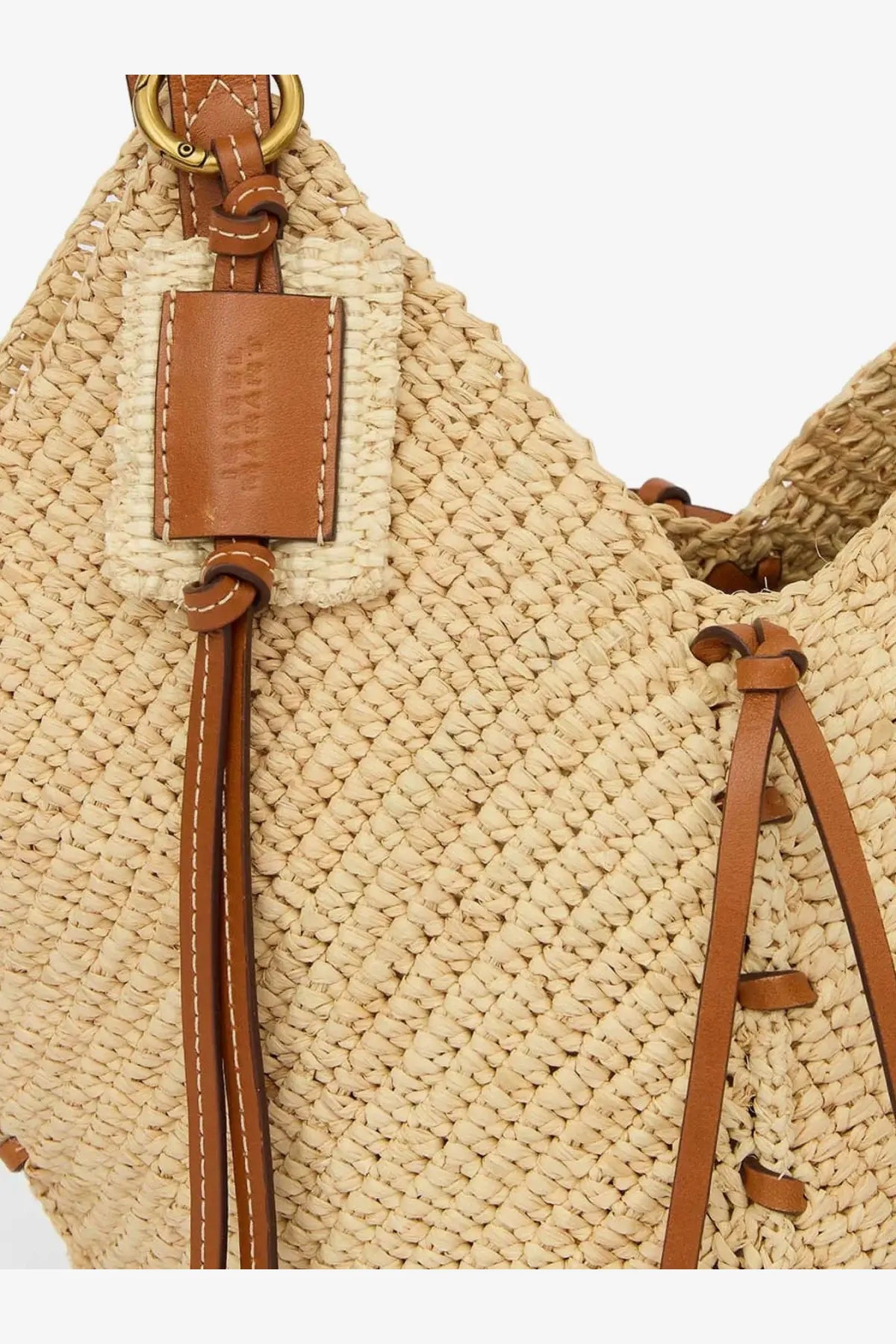 Beige woven straw Isabel Marant women’s losange raffia shoulder bag with tan leather straps and branded leather tag