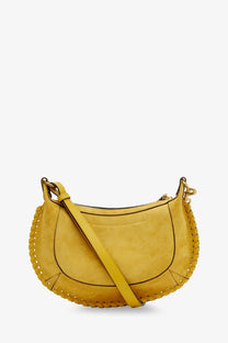 Isabel Marant women’s oskan moon suede crossbody bag in mustard yellow with braided leather trim and gold-tone hardware