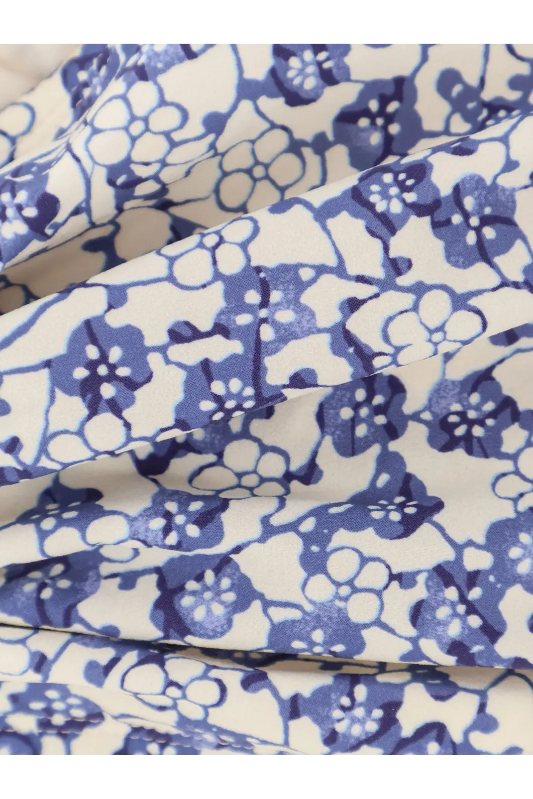 Isabel Marant women’s salma bikini top in blue with white floral pattern and delicate textured weave fabric