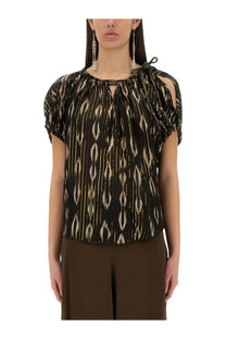 Isabel Marant women’s black blouse with gold ikat pattern short puffed sleeves and tied neckline