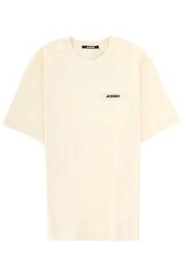 Jacquemus men’s beige oversized cotton t shirt with minimalist black logo patch and matching neckline label