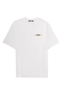 Jacquemus men’s white oversized cotton t-shirt with minimalist design and beige jacquemus label at the chest