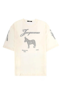 Cream-colored jacquemus men’s le ane mc shirt with gray embroidered donkey graphic and printemps été 2026 text