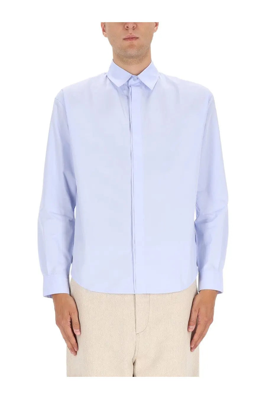 Jacquemus men’s le simon light blue long-sleeved button-down shirt with crisp collar and clean lines