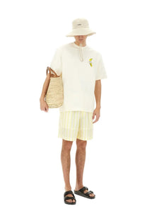Jacquemus men’s oversized cream short-sleeved t-shirt with embroidered yellow and green leaf logo on chest