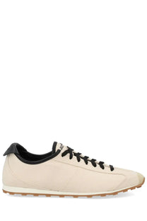 Jacquemus men’s sneaker les tennis white cream canvas sneaker with black laces tongue and heel tab front view