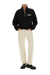 Jacquemus men’s black half-zip sweatshirt with white logo patch on chest in jacquard fabric for casual wear