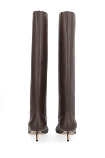 A pair of jacquemus women’s tourni brown over-the-knee boots in dark brown leather with slender stiletto heels