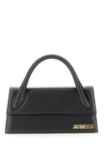 Black leather jacquemus borsa le chiquito long handbag with gold-tone branding on the front