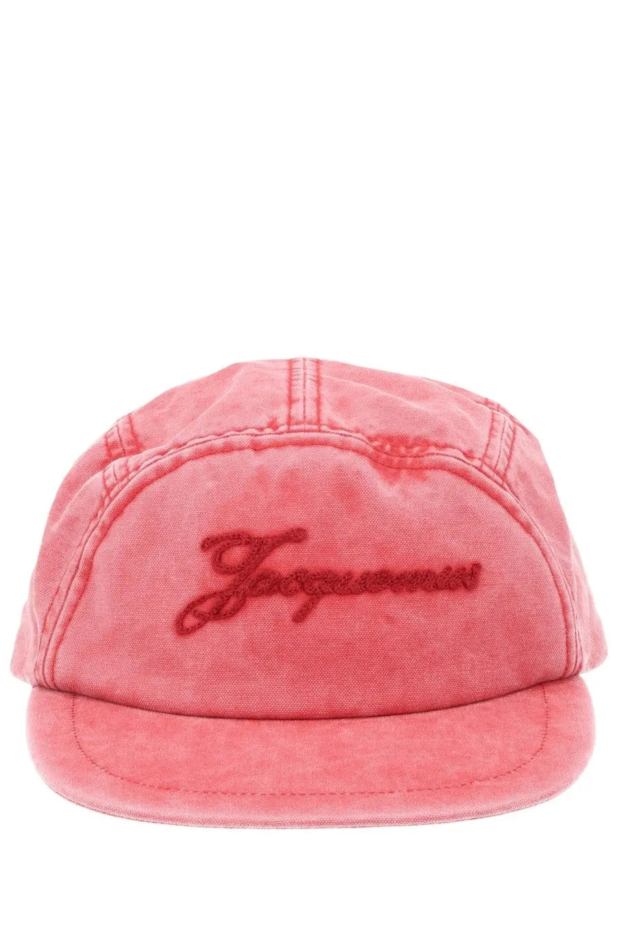 A faded coral pink jacquemus women’s five-panel cap with flat brim and dark red embroidered jasper script front