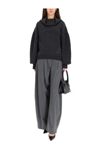 Black cowl neck knit sweater with subtle embroidered logo detail in jacquemus women’s jersey ball grey collection