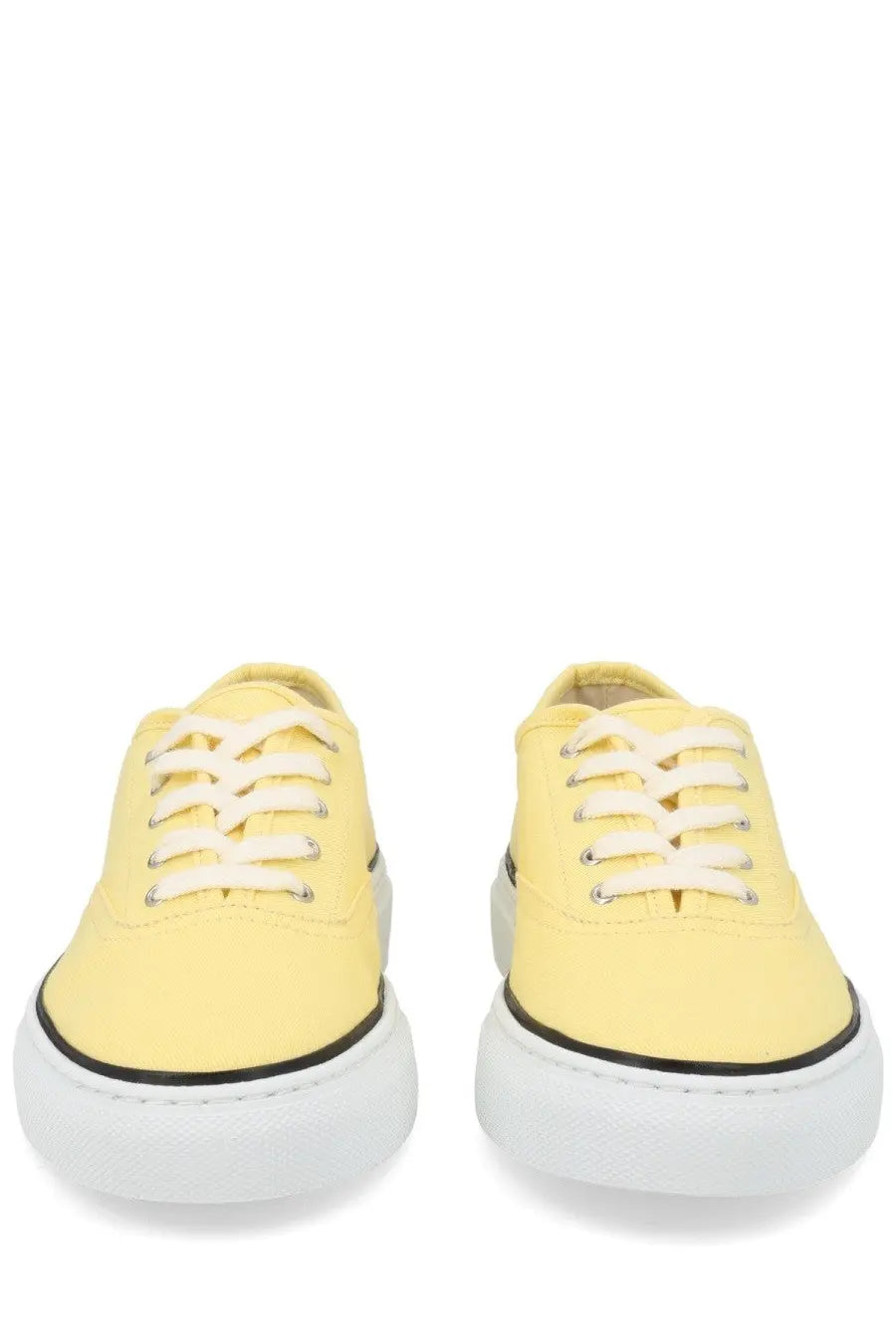 Pair of jacquemus women’s sneaker e e yellow pale yellow canvas sneakers with white laces and thick white rubber sole