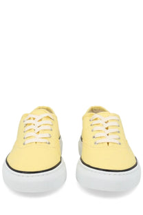Pair of jacquemus women’s sneaker e e yellow pale yellow canvas sneakers with white laces and thick white rubber sole