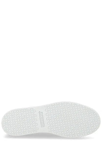 White rubber sole with interlocking squares and circles pattern embossed with sneakers on jacquemus yellow sneaker