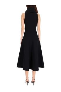 Black sleeveless jacquemus triangle dress with high collar and flared midi skirt for elegant occasions