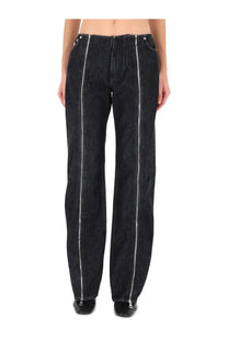 Jean Paul Gaultier women’s black denim jeans with prominent silver double zippers on the outer seams