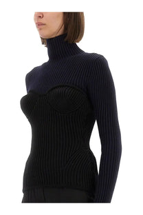 Jean Paul Gaultier women’s blue shirt featuring a black ribbed knit turtleneck sweater with structured bodice detailing