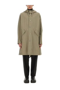 Olive-green hooded trench coat with silver buttons and flap pockets in jil sander men’s parka green design