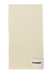 Cream-colored ribbed knit wool scarf with minimalist white jil sander label for men in beige