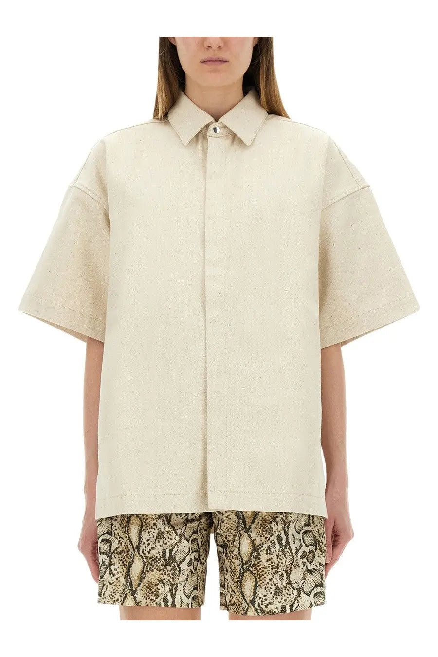 Cream-colored jil sander women’s heavy cotton oversized short-sleeved button-up shirt with relaxed fit and stitching details