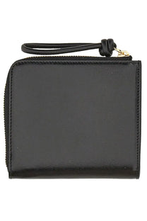 Jil Sander women’s black patent leather card holder with gold-tone zipper and braided wrist strap