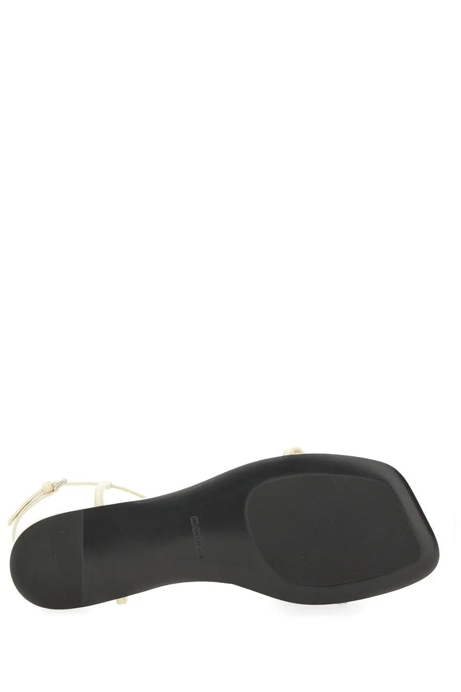 Jil Sander women’s leather sandal white with black rubber sole and cream-colored thin straps front view