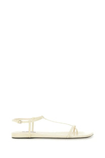 Cream-colored jil sander women’s leather sandal with thin straps and flat sole for minimalist style