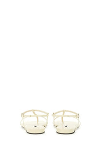 Jil Sander women’s leather sandal white with cream-colored t-strap and sleek minimalist thin straps