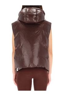 Brown shiny padded puffer vest with hood by jil sander for women in red shown from the front