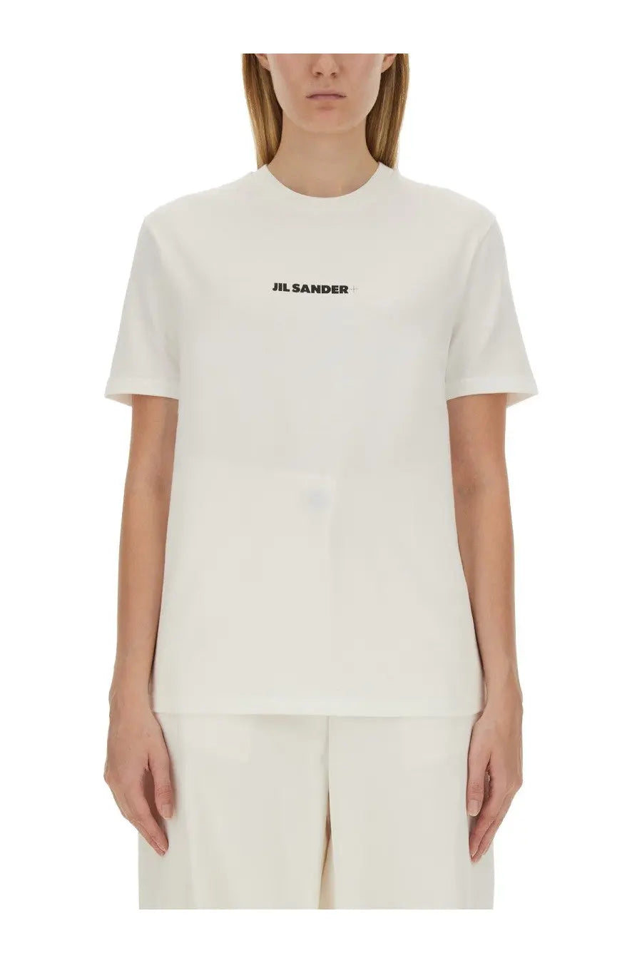 Off-white short-sleeved jil sander women’s shirt with black embroidered logo on the chest in cotton fabric