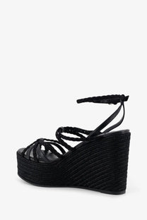 Jimmy Choo women’s Nyra black leather braided wedge sandal with textured espadrille-style raffia heel