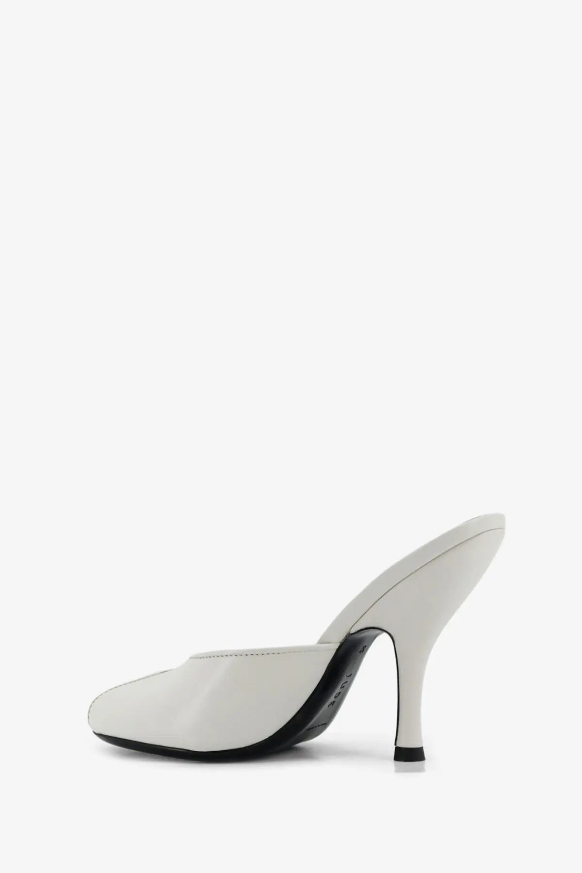 White leather jude women’s mule sandals with sleek minimalist design and black sole viewed from the back