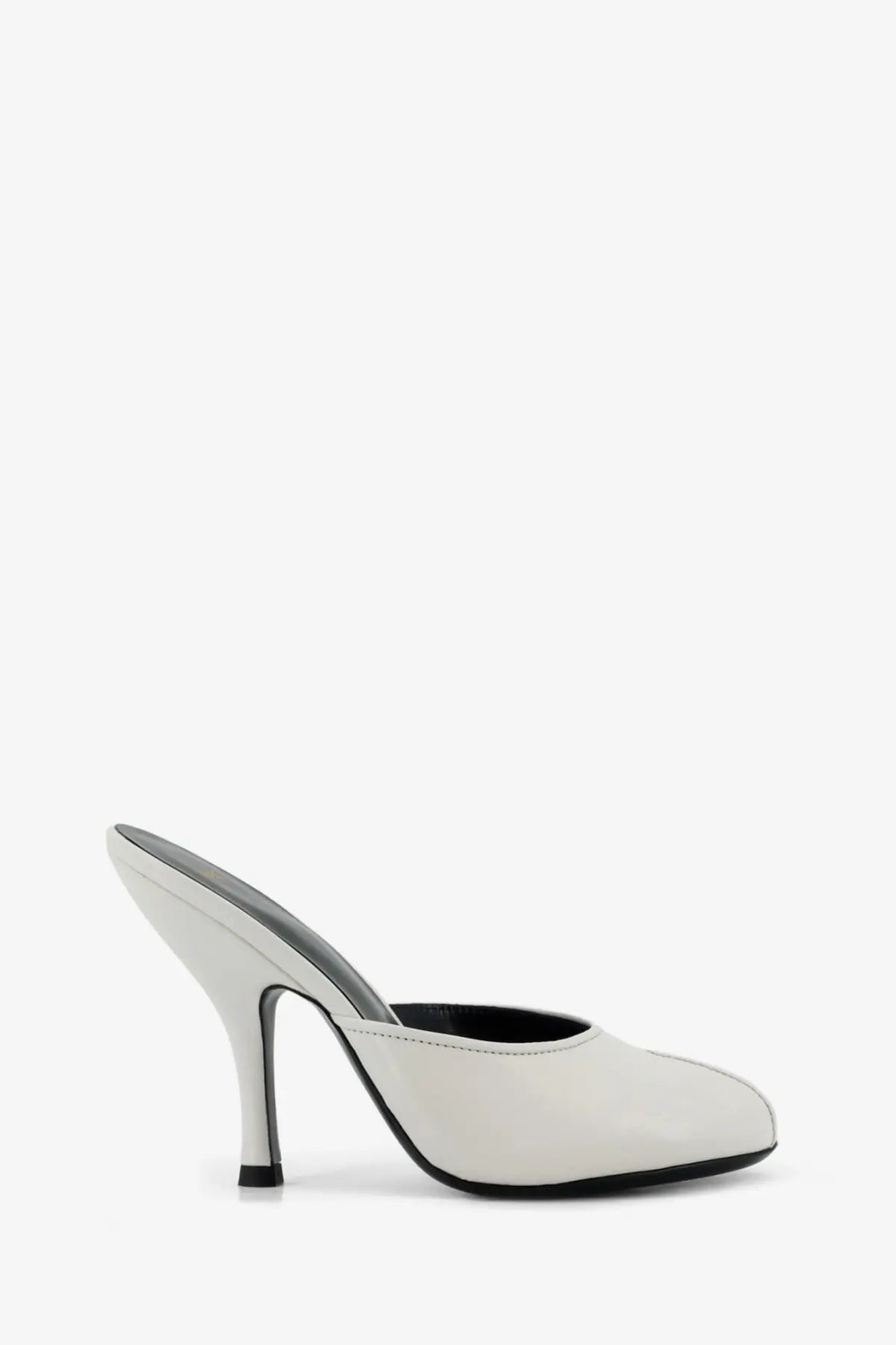 A sleek white leather Jude women’s mule sandal with black sole and heel accent for date wear