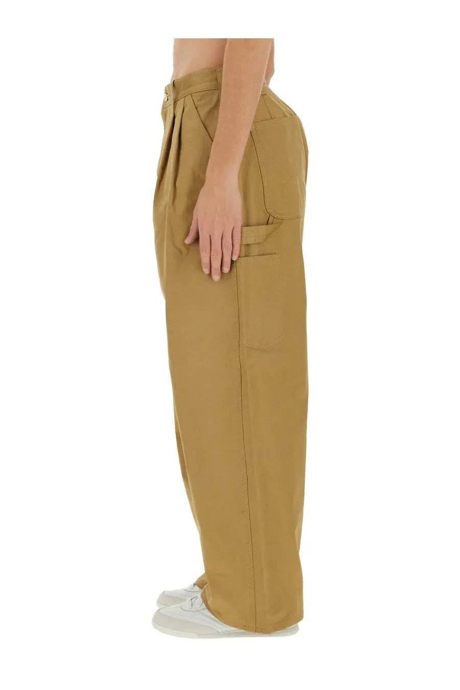 Tan wide-leg cargo pants with relaxed fit and multiple pockets from junya watanabe man and carhartt beige collection