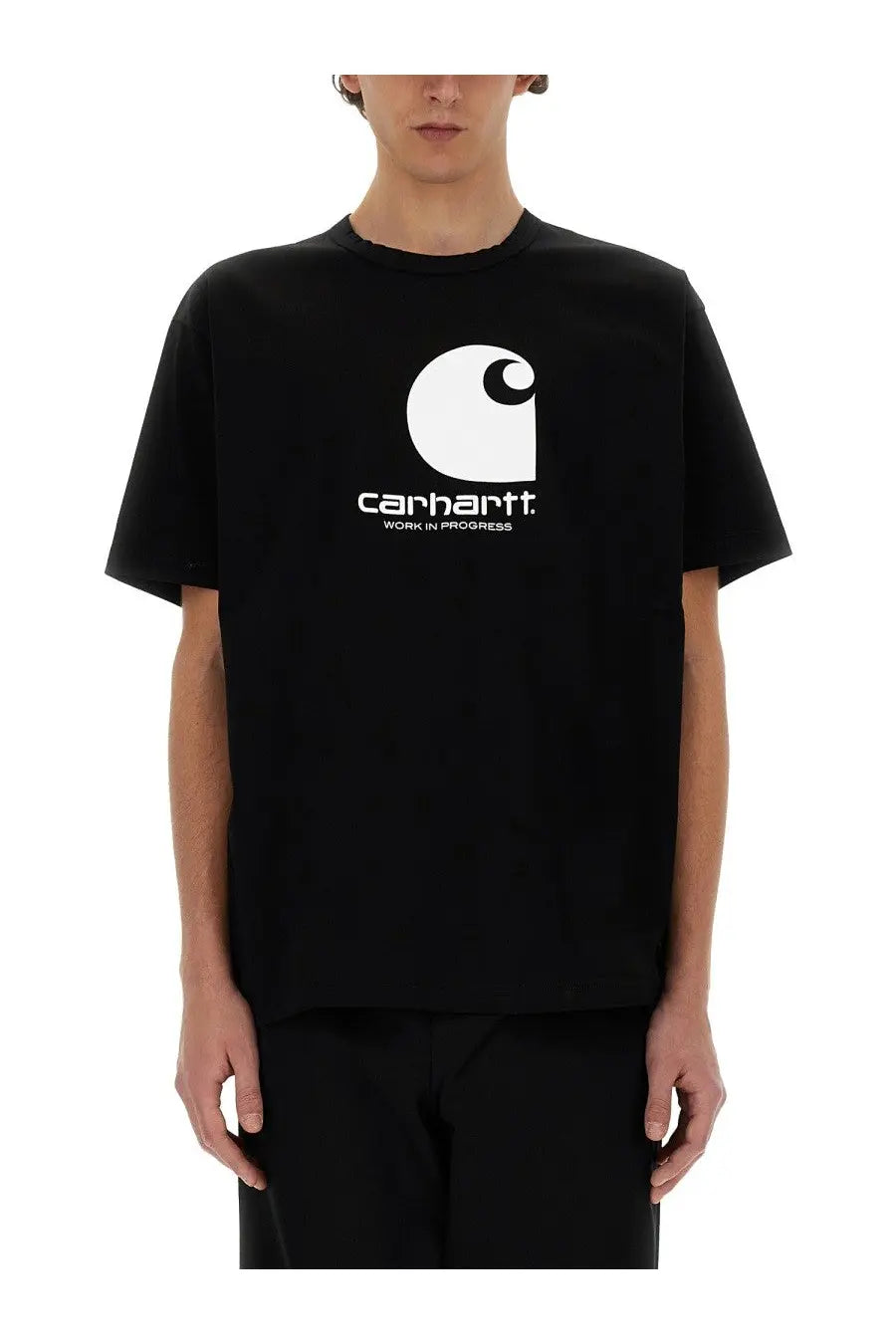 Black Carhartt t-shirt featuring a white circular logo with brand name and work in progress text by Junya Watanabe Man
