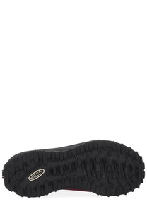 Back side of keen women’s jasper zionic sneaker red showing black rubber sole with deep tread and silver keen logo on heel